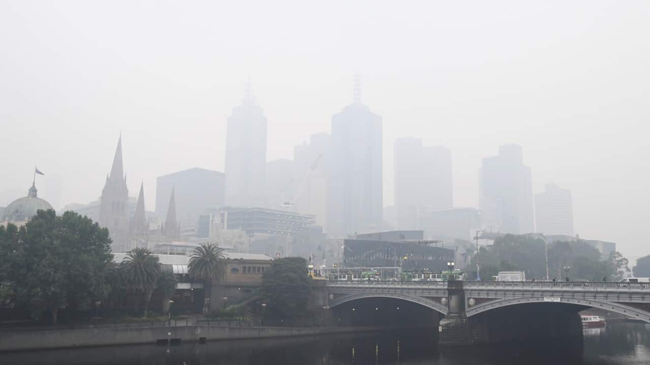 Melbourne City buildings seen through smoke haze from bushfires in Victoria