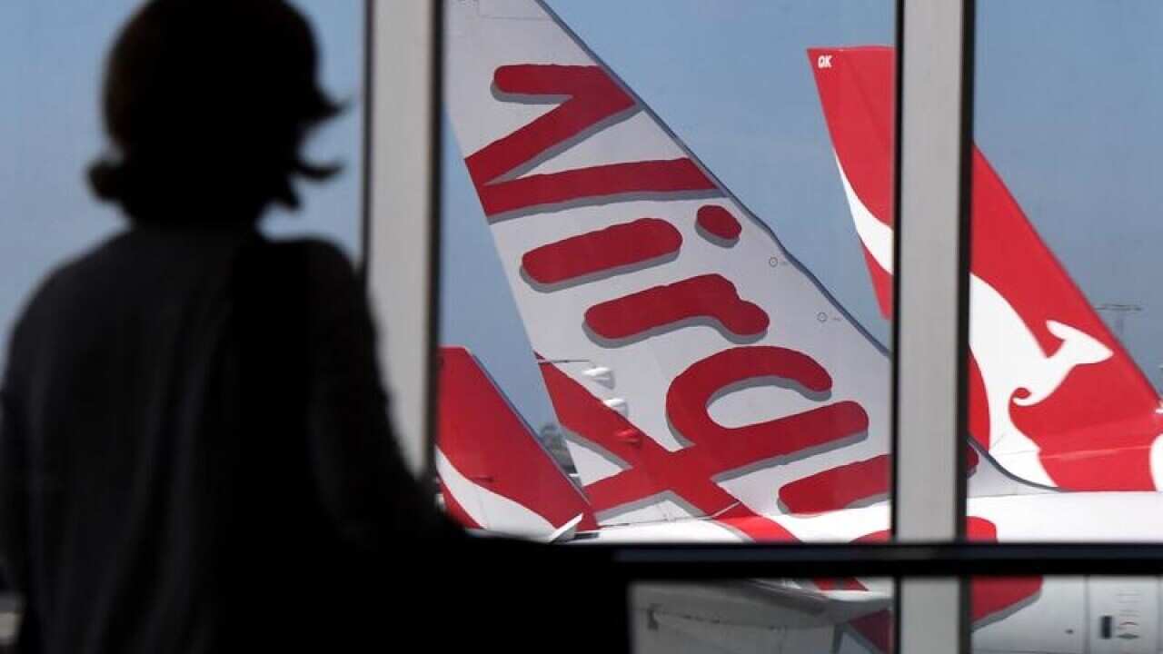 Virgin Australia and Qantas planes at Sydney Airport