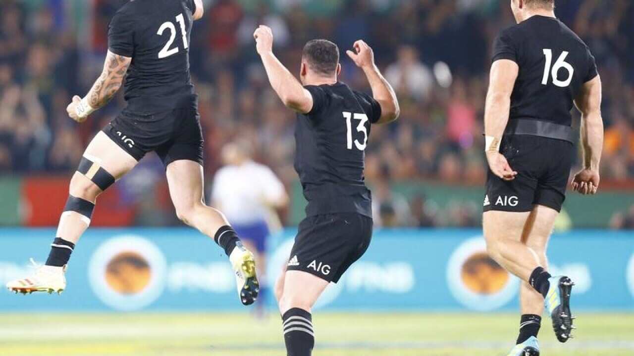 All Blacks players celebrating