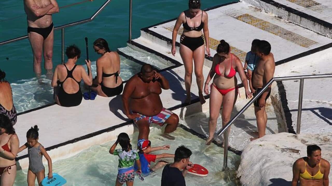 Beachgoers are seen at Bondi Beach, Sydney.