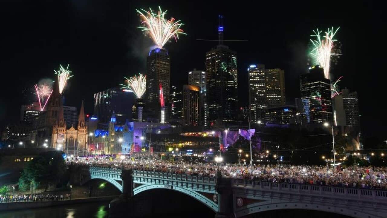 Fireworks explode over the Princes Bridge