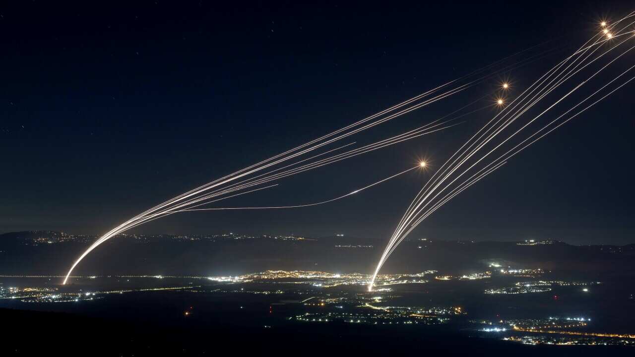 Projectiles fired from the Israeli Iron Dome air defense system to intercept missiles fired from southern Lebanon, over the upper Galilee, northern Israel, early 04 August 2024.