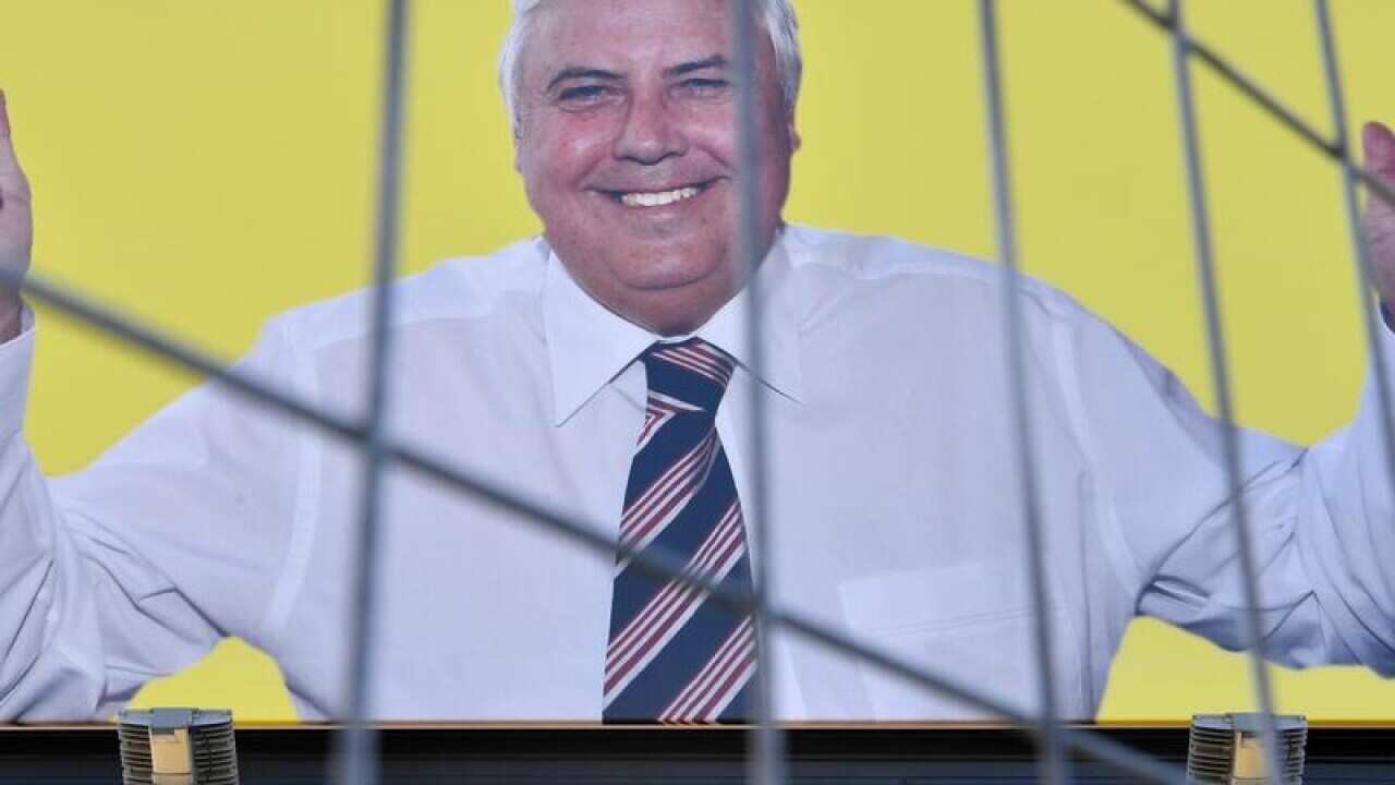 A billboard featuring Australian former politician, Clive Palmer.