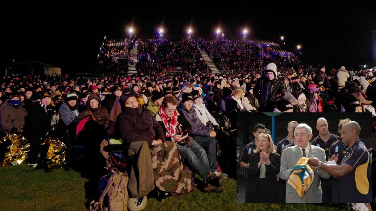 People stand during the wreath-laying ceremonies at the Australian National Memorial in Villers-Bretonneux, northern France, on Anzac Day, Wednesday, April 25, 2018. Anzac Day honors the men of the Australia-New Zealand Army Corps who died in World War I at the 1915 battle for Gallipoli, Turkey. It has since come to honor the sacrifices made by all service members in the Australian and New Zealand Armed Forces. (AP Photo/Michel Spingler)
