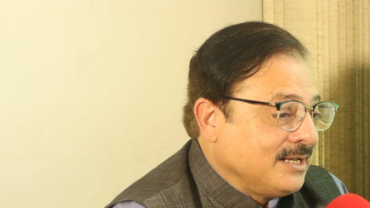 Muhsin Gillan with Masood Mallhi.