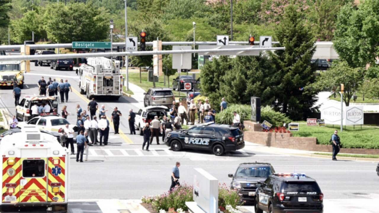 Police respond to a shooting reported at Capital Gazette newspaper in Annapolis.