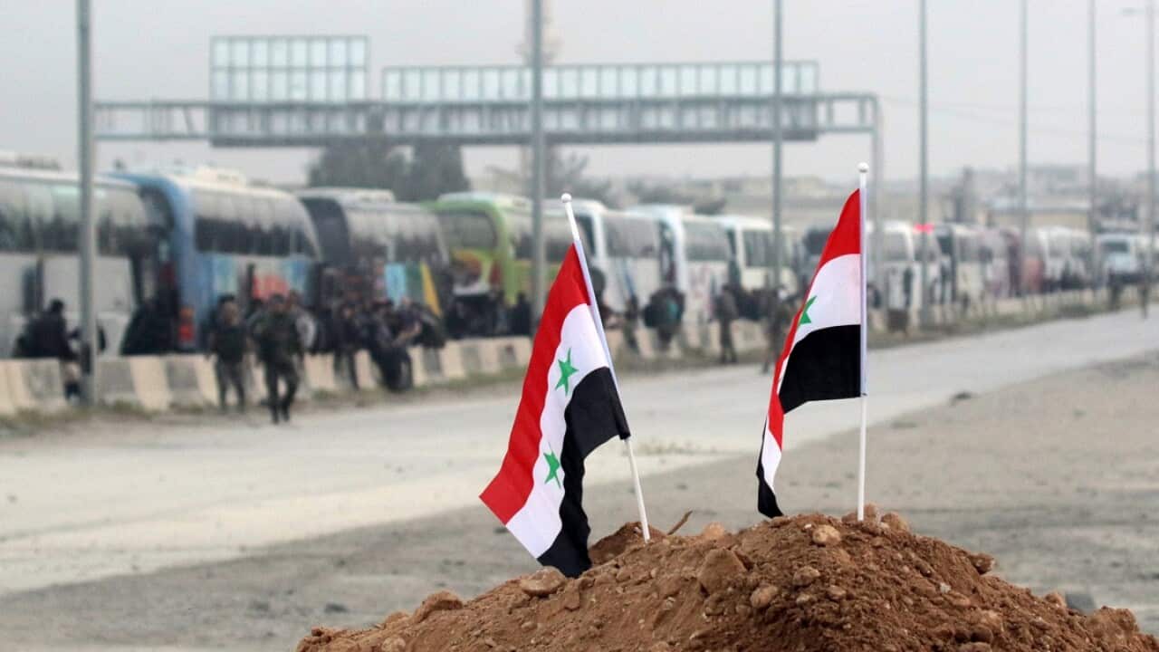 Buses carrying the fighters and their families entered the northwestern province of Idlib.