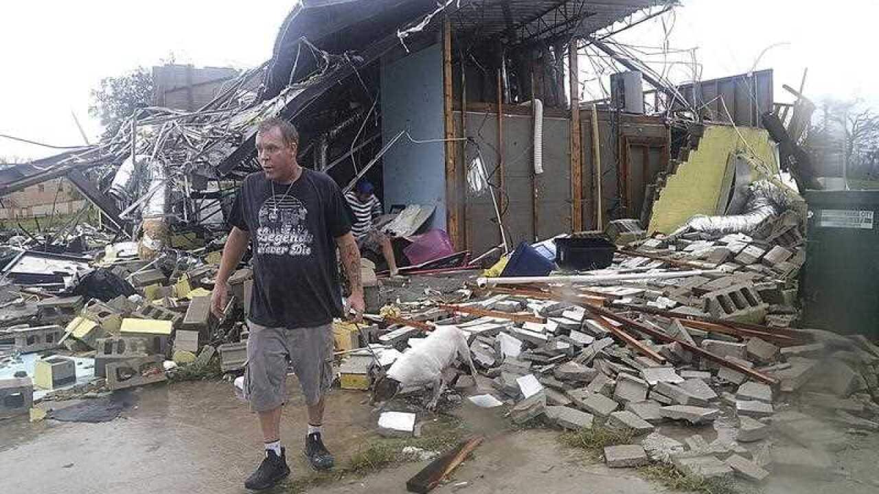 Brian Bon inspects damages in the Panama City downtown area after Hurricane Michael made landfall in Panama City, Florida.