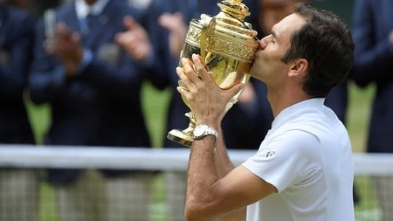 Federer crushes suffering Cilic for eighth Wimbledon title