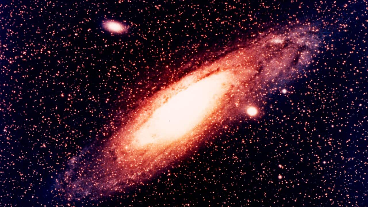 File photo: Large Spiral Galaxy, Andromeda, With Two Small Companion Galaxies. 