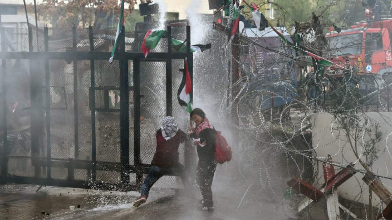 Protesters in Beirut are stopped from approaching the US embassy
