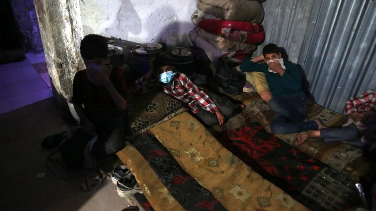 Injured victims of an alleged chemical attack rest in rebels-held Douma, Syria, 08 April 2018. 