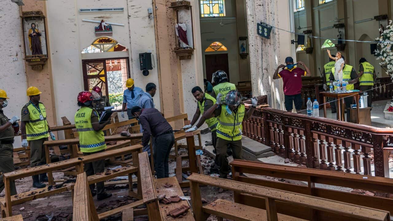 Investigators in Negombo, Sri Lanka, on Monday, April 22, 2019, at the scene of a suicide bombing at St. Sebastian Church.