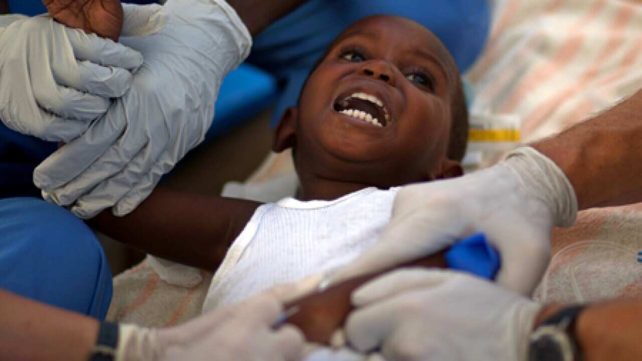 haiti_cholera_baby_cry_101117_B_ap_1921695580