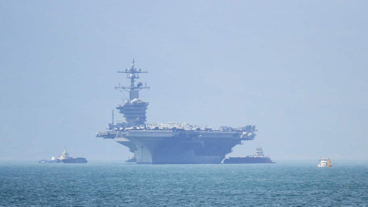 The USS Carl Vinson pulls into port in Danang on March 5, 2018.