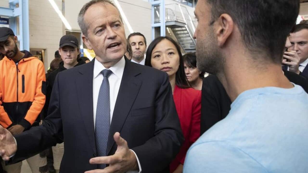 Leader of the Opposition Bill Shorten (L)