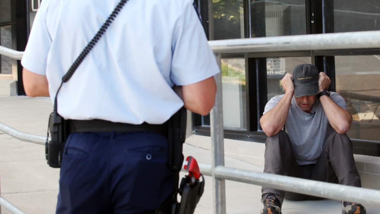 Police use an actor to show a confrontation with a mentally ill person