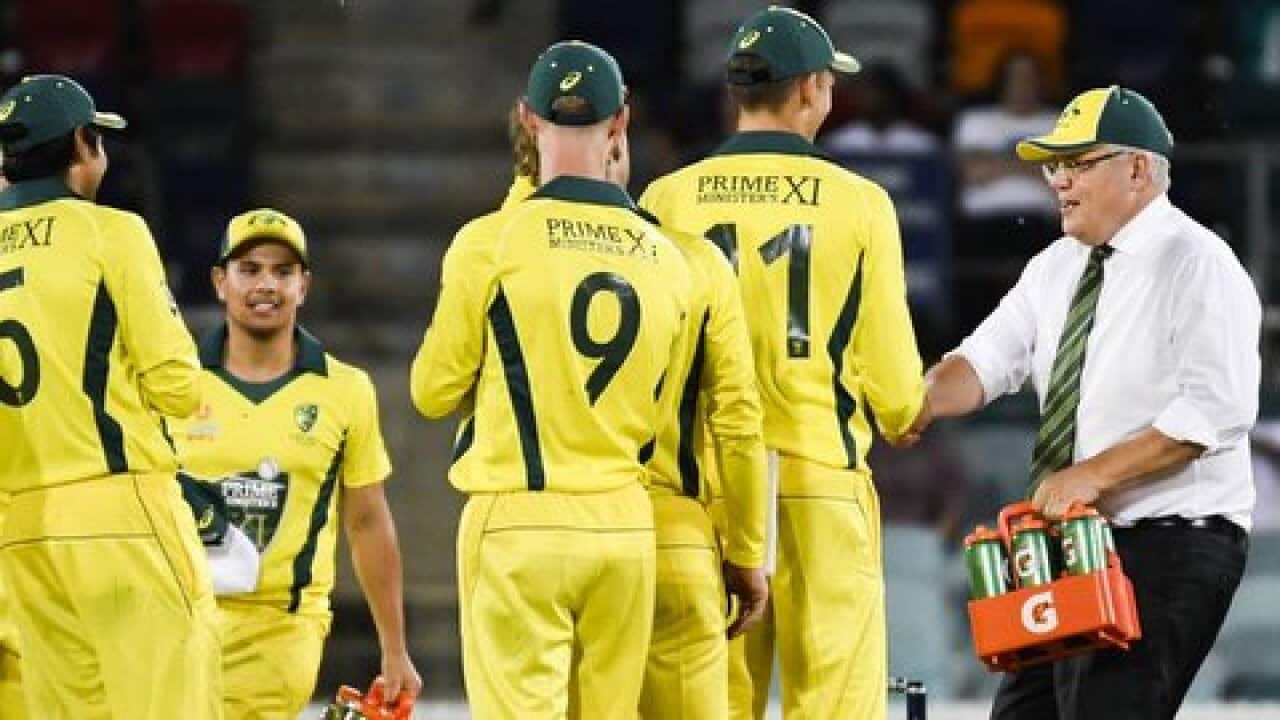 Aus PM brings drinks to the Priminiter's XI team