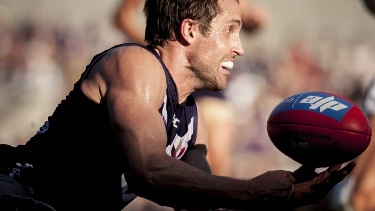 Luke McPharlin of the Fremantle Dockers