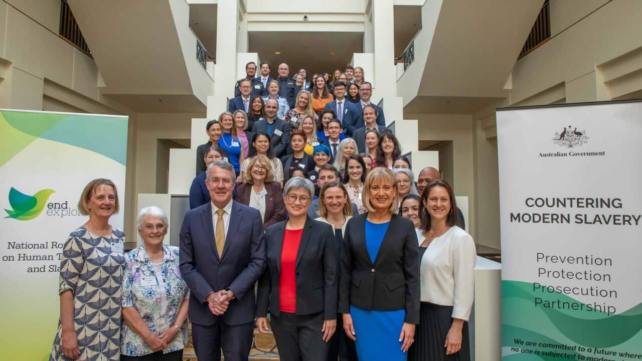 A group photo of attendees at the 15th National Roundtable on Human Trafficking and Slavery on 5 December 2023.