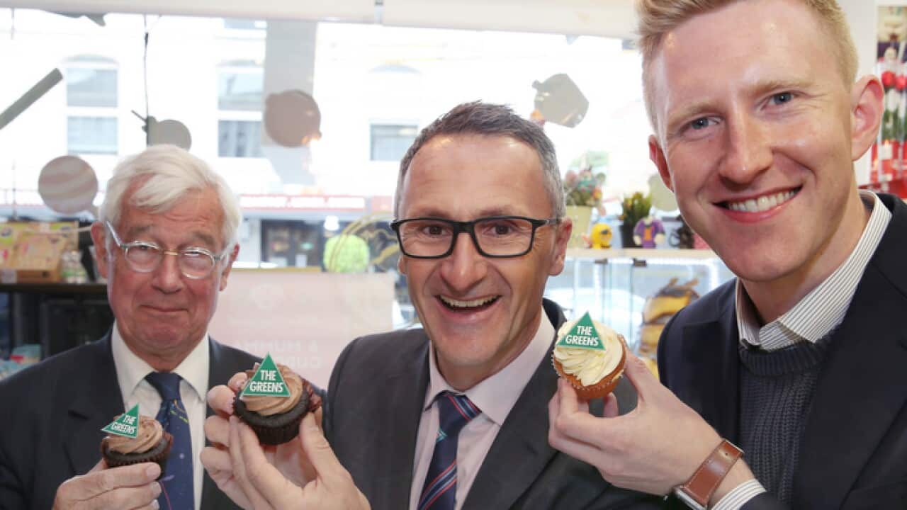 (L-R) Greens candidate for Kooyong Julian Burnside, Greens leader Richard Di Natale and Greens candidate for Higgins Jason Ball pose for a photo