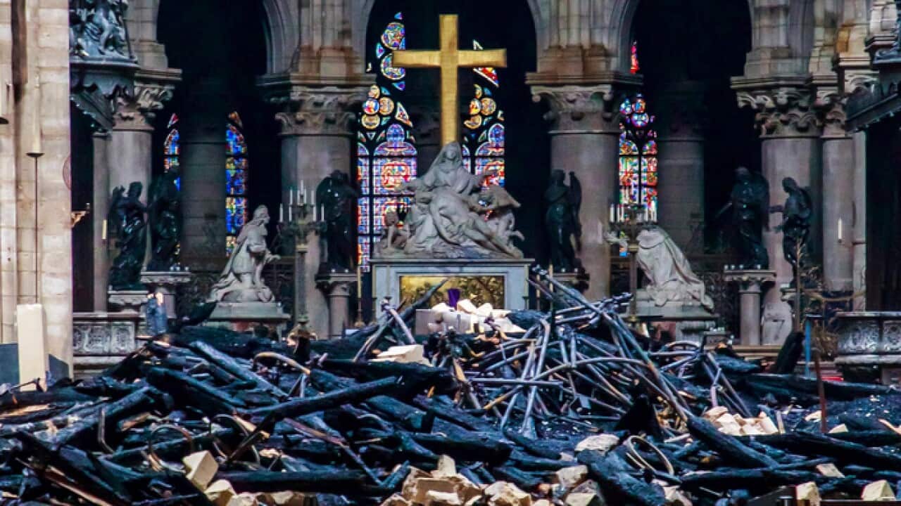 : Debris are seen inside Notre Dame cathedral in Paris