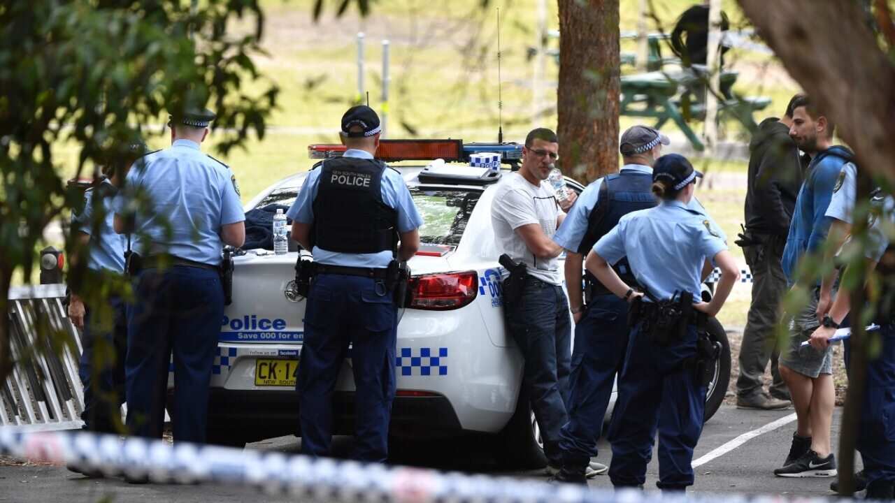 NSW Police are seen at the Buffalo Creek Reserve following the discovery of a body, in Hunters Hill, Sydney