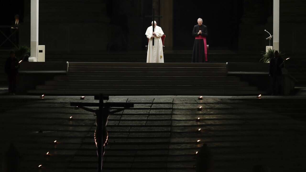 Pope Francis presides over the Via Crucis ceremony in an empty St Peter's Square