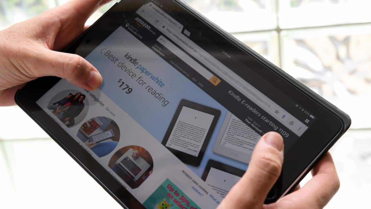 A tablet is seen displaying Amazon's Australian website