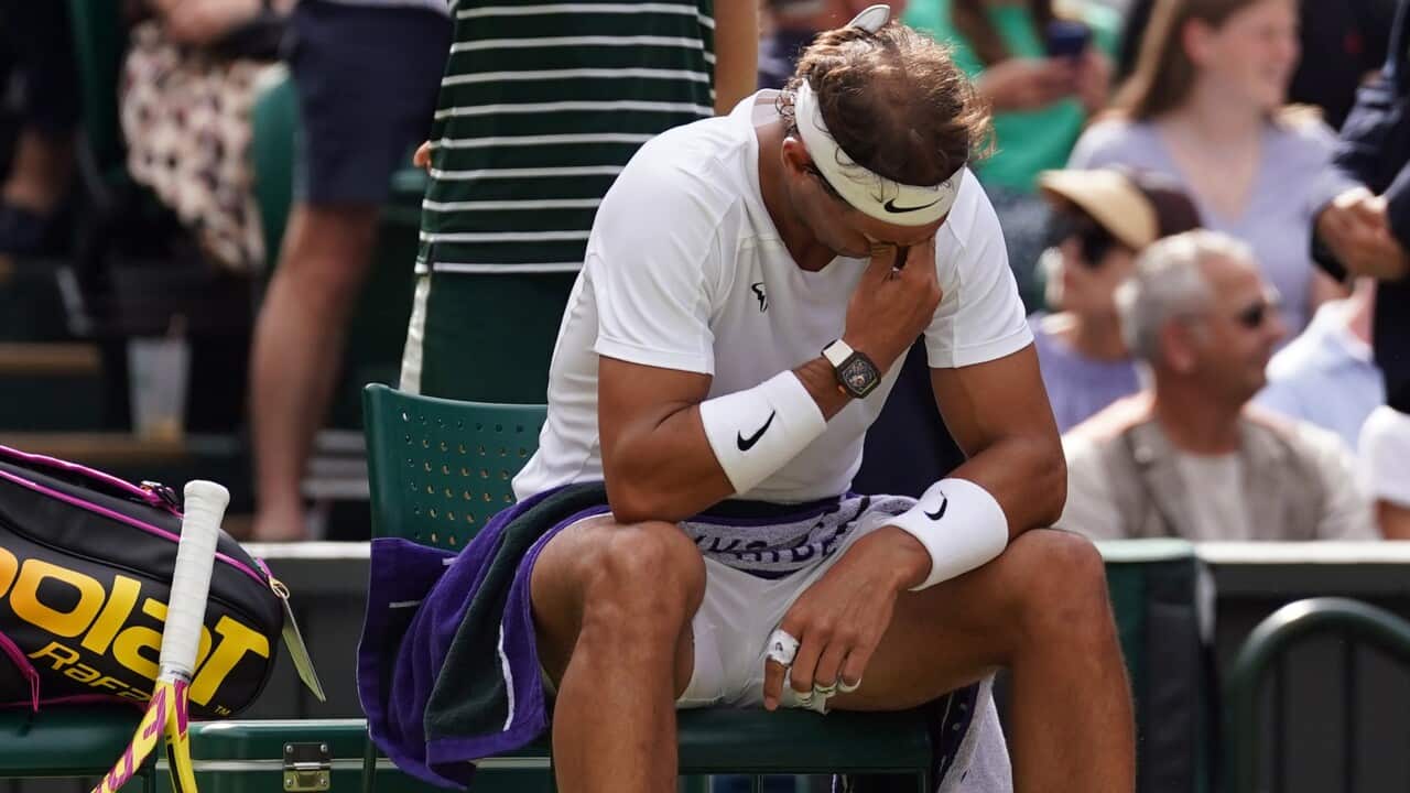 Rafael Nadal appears dejected during his match against Taylor Harry Fritz.