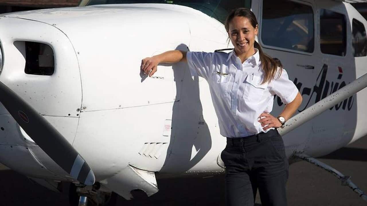 Par Avion pilot Nikita Walker posing for a photograph