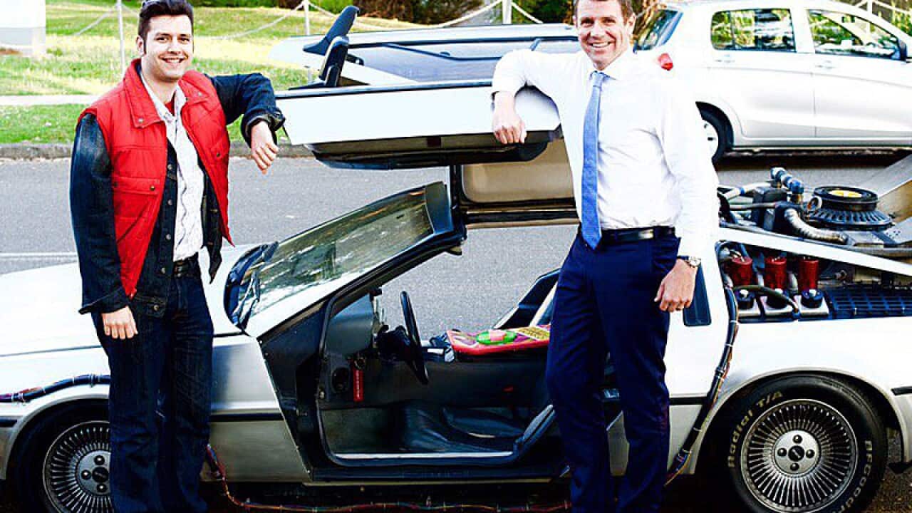 NSW Premier Mike Baird with a DeLorean