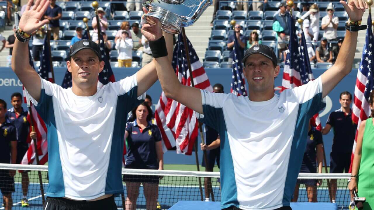 Bob and Mike Bryan celebrate their US open doubles win.