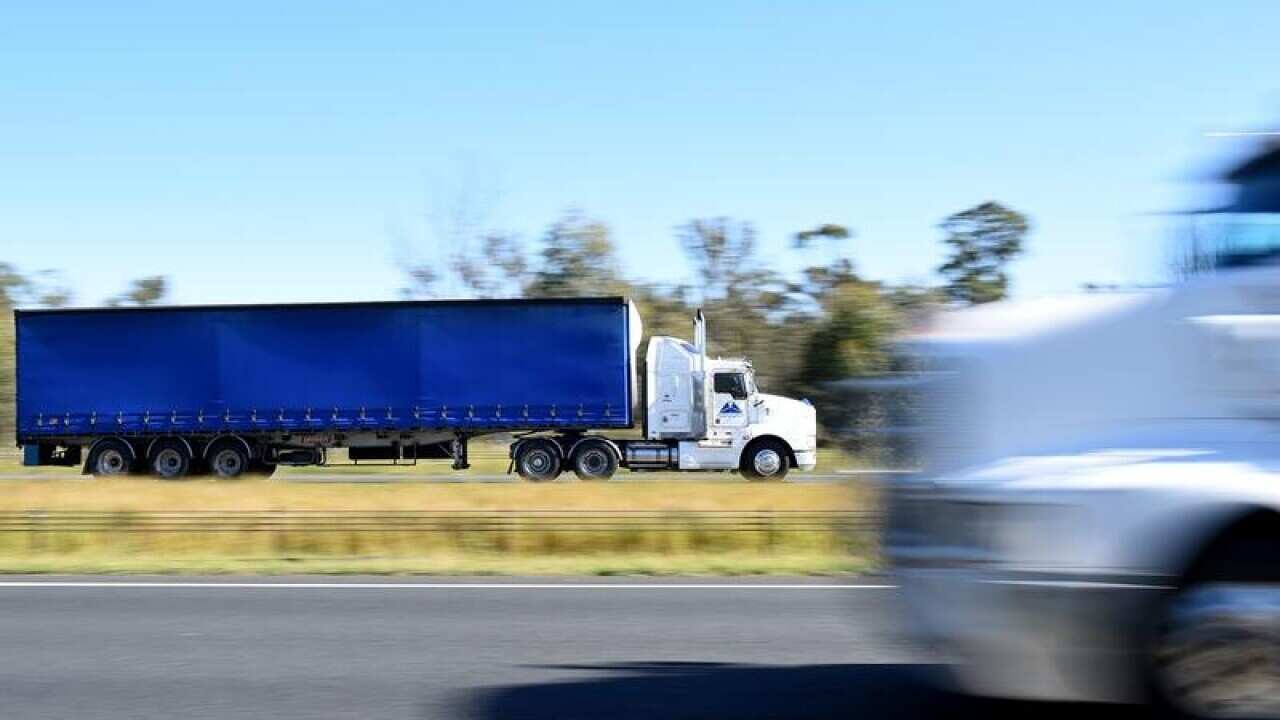 General view of heavy transport on the M7 motorway in Sydney.