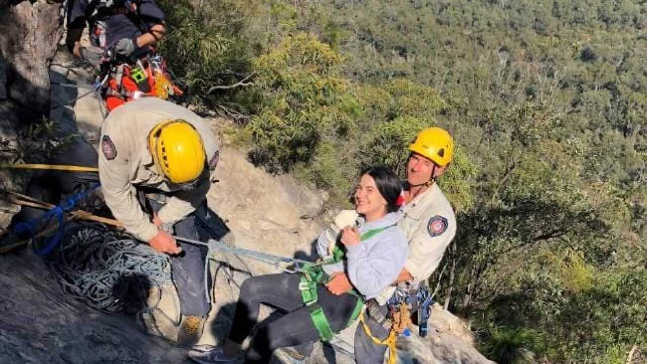 Sarah was abseiled down the mountain.