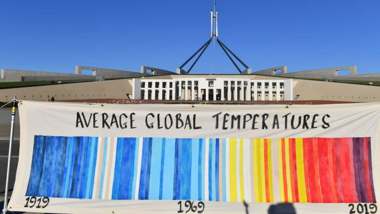 A banner depicting global temperatures by knitters fromthe Christian group Common Grace's Knit