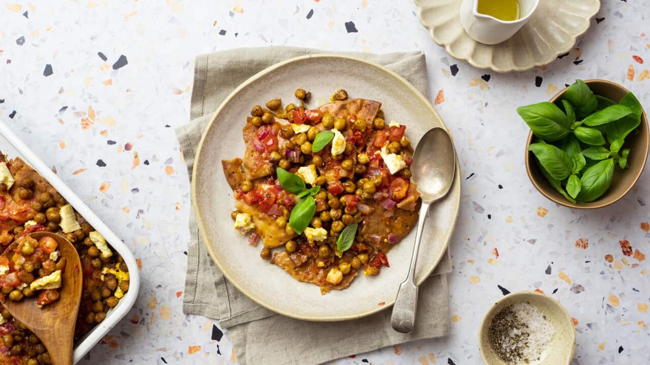 Baked dakos with spiced chickpeas, tomato and feta