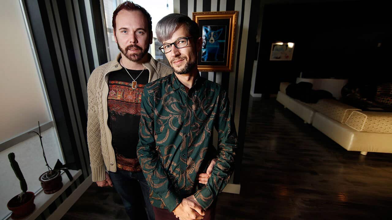 Charlie Craig and David Mullins are shown in their home in Denver.