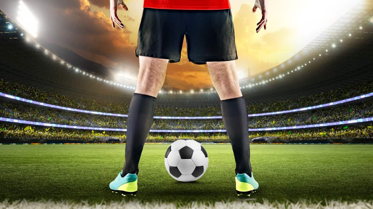 football player standing in soccer stadium competition arena for cup