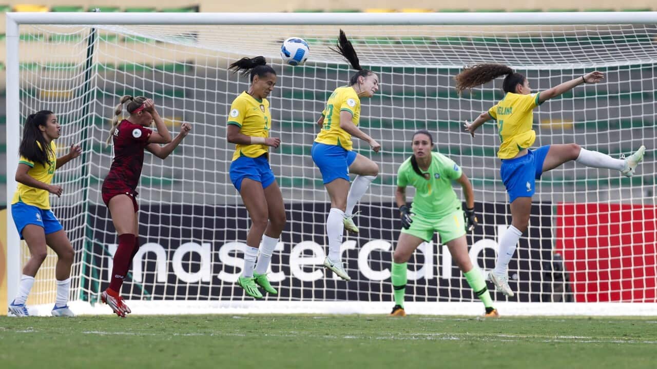 Kathellen (3-L) and Antonia (3-R) of Brazil in action against Venezuela during the women's Copa América group B soccer match at Centenario stadium in Armenia, Colombia, 18 July 2022. EPA/ERNESTO GUZMAN JR