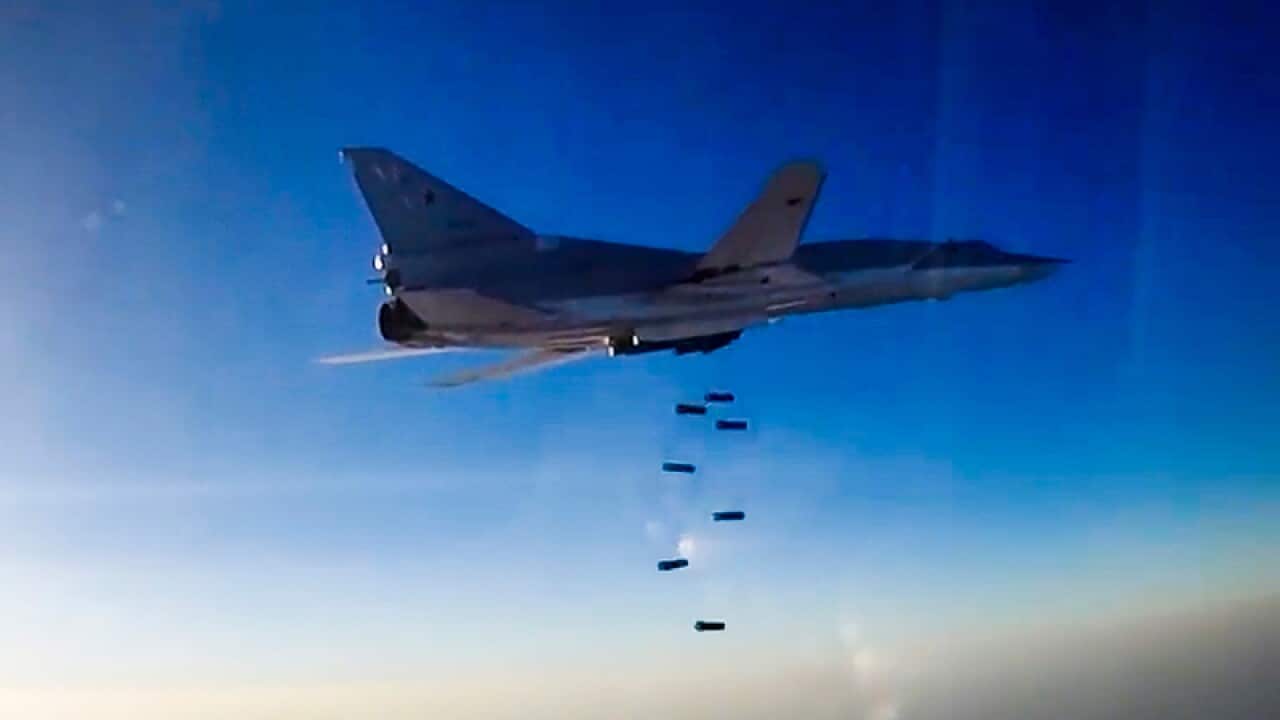 Russian long range bomber Tu-22M3 flies during an air strike over Aleppo region of Syria