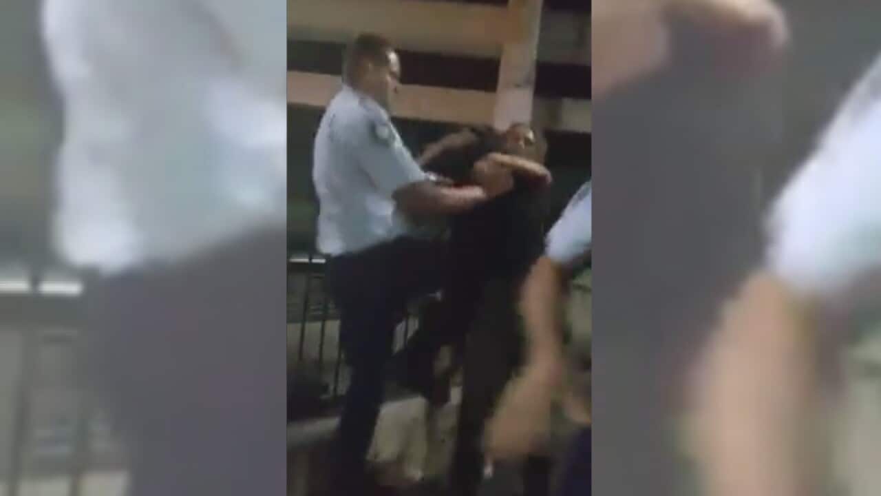 Footage from the video showing police and a group of teenagers at Mount Druitt.