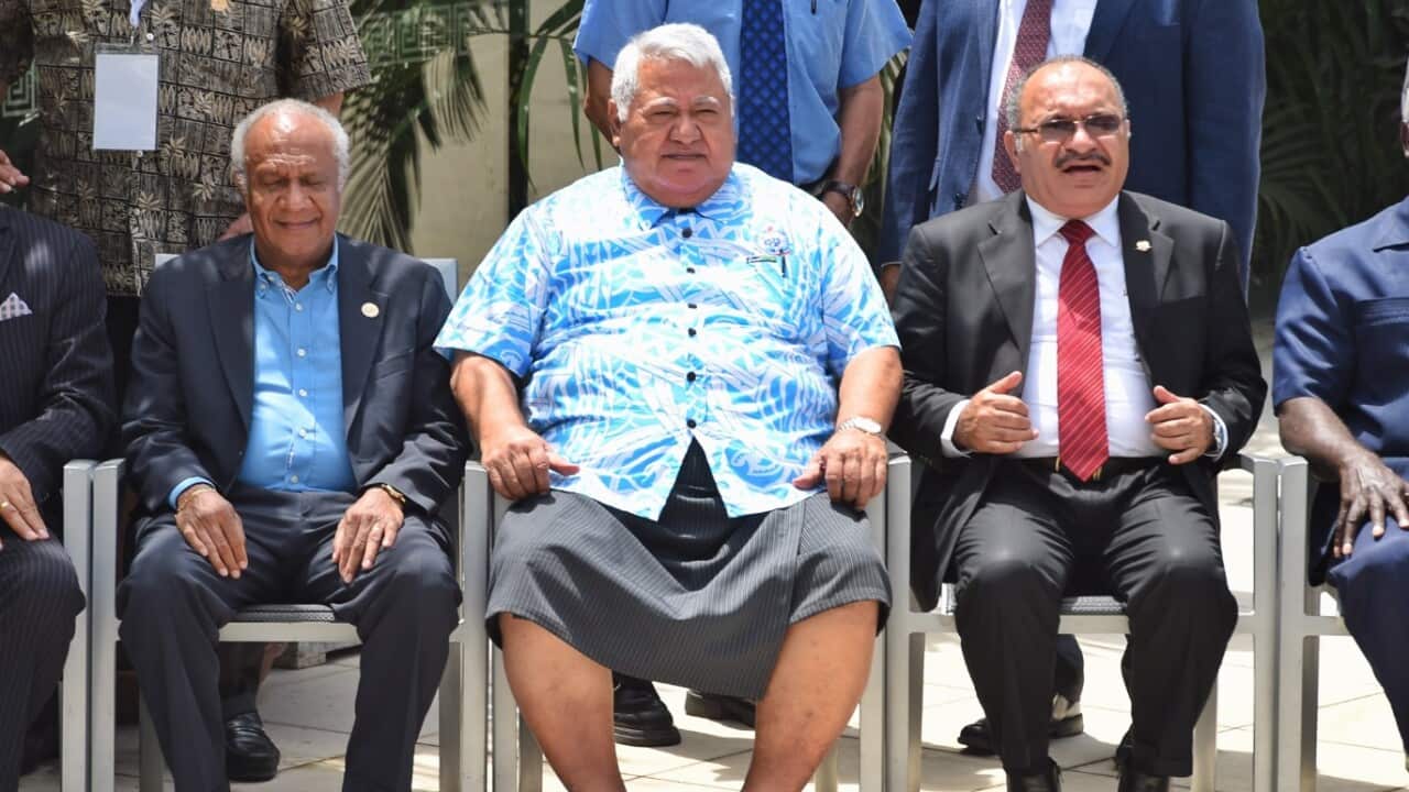 Samoa's Prime Minister Tuilaepa Sa'ilele Malielegaoi (Middle)