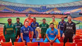 AHMEDABAD, INDIA - OCTOBER 04: In this image supplied by ICC, Temba Bavuma, captain of South Africa, Babar Azam, captain of Pakistan, Jos Buttler, captain of England, Scott Edwards, captain of Netherlands, Dasun Shanaka, captain of Sri Lanka, Shakib Al Hasan, captain of Bangladesh, Rohit Sharma, captain of India, Pat Cummins, captain of Australia, Hashmatullah Shahidi, captain of Afghanistan and Kane Williamson, captain of New Zealand pose with the trophy during Captains' Day prior to the ICC Men's Cricket World Cup India 2023 at Narendra Modi Stadium on October 04, 2023 in Ahmedabad, India. (Photo by ICC/ICC via Getty Images)