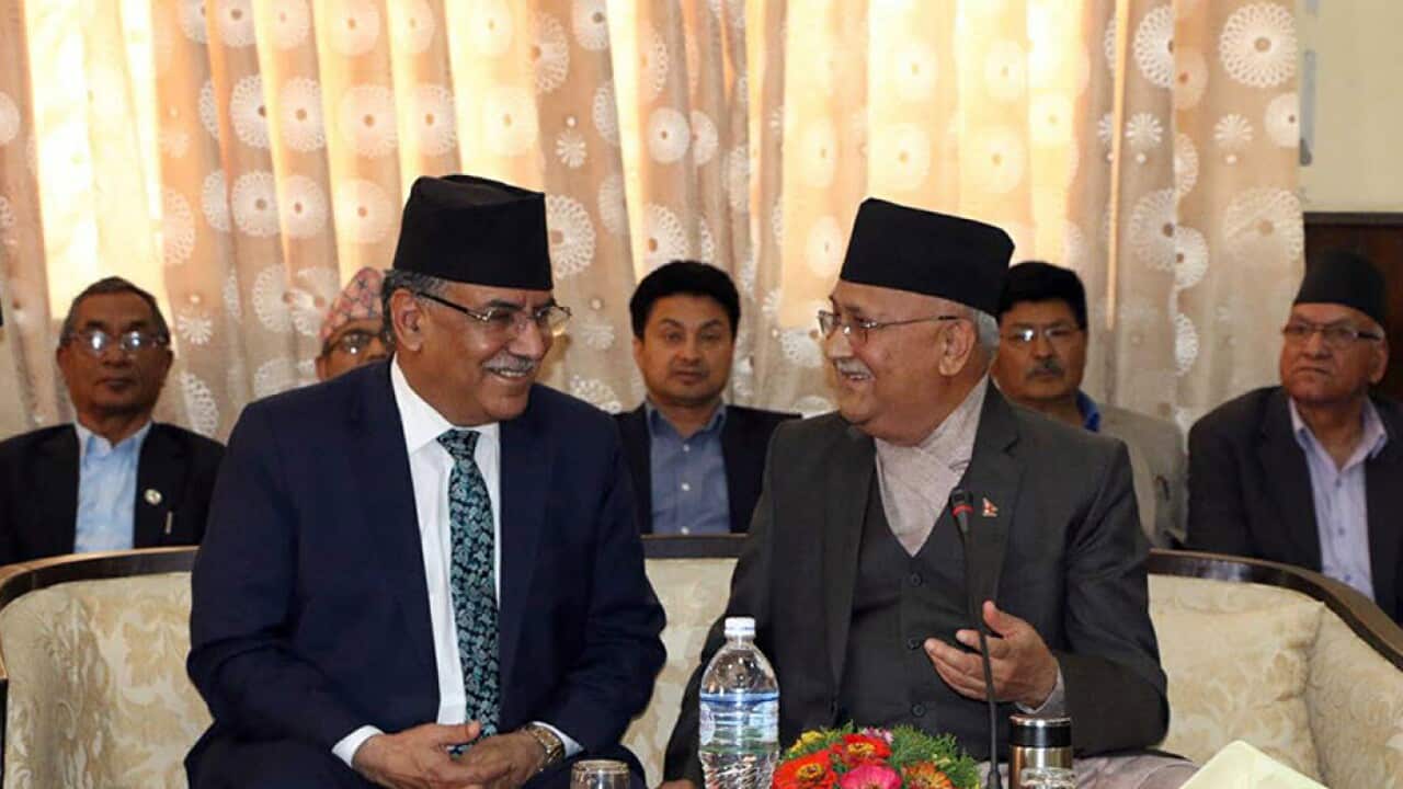 Nepal Communist Party President KP Sharma Oli (right) and Pushpa Kamal Dahal (left) after the announcement of their party unity in May 2018.