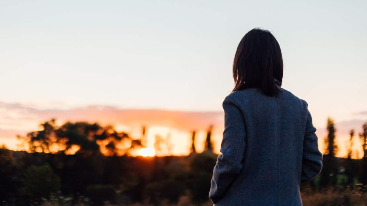 Lonely Woman Watching Sunset