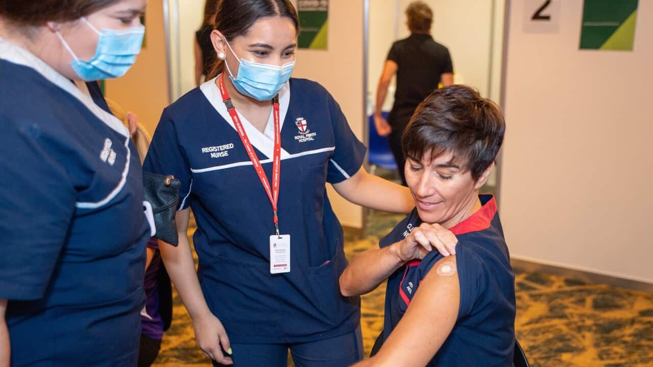 Nurse Antonia Garza has just received the Pfizer coronavirus vaccine in Perth