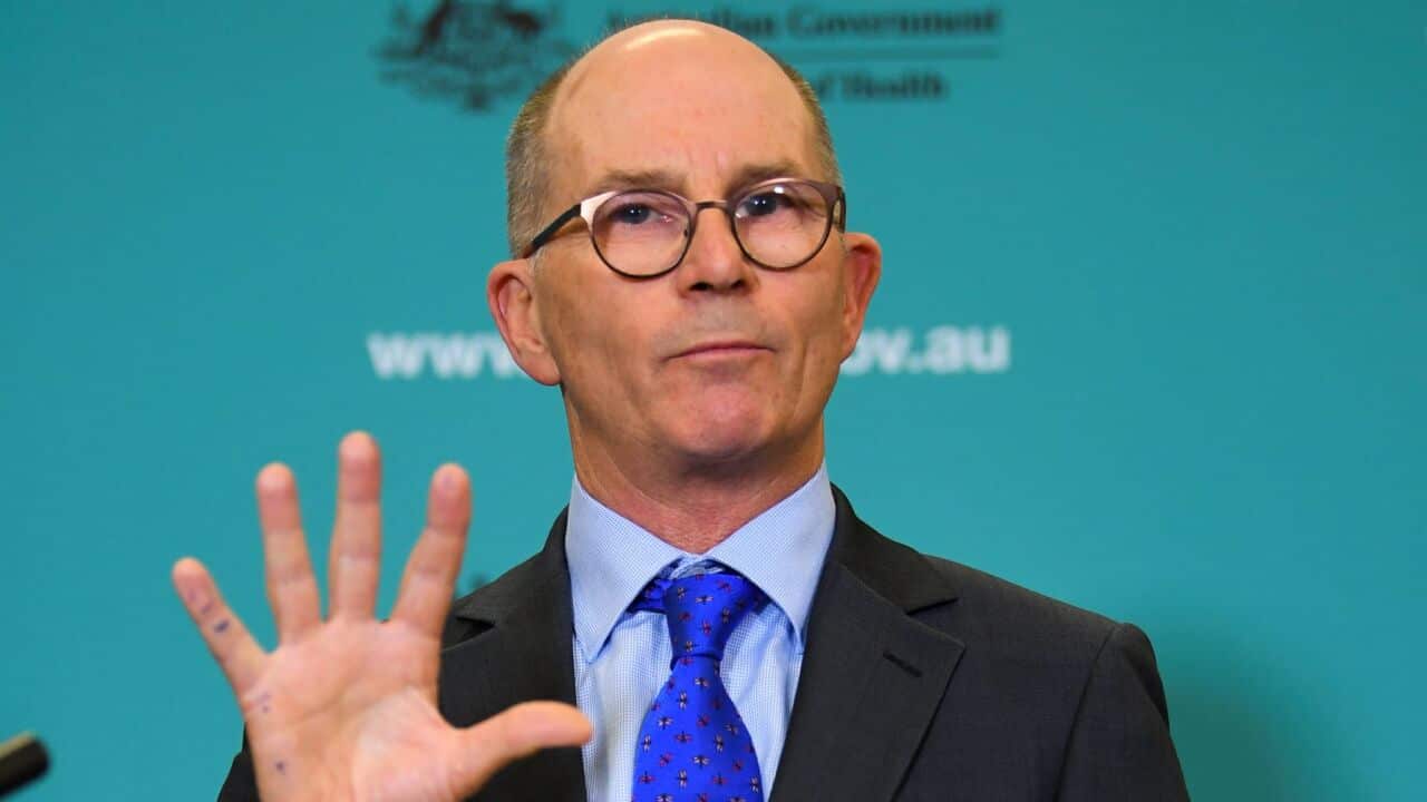 Deputy Chief Medical Officer Professor Paul Kelly speaks to the media