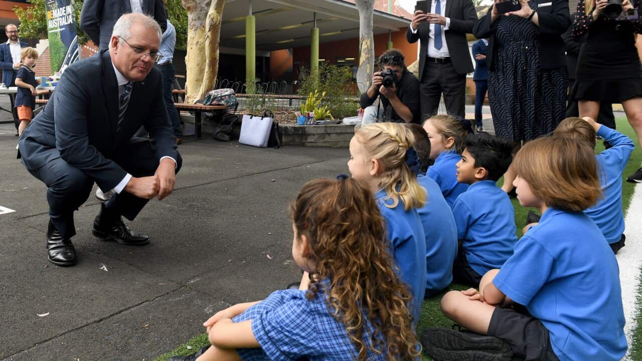 Australian Prime Minister Scott Morrison speaks to students the launch of ‘ReMade in Australia’ at Woollahra Public School in Sydney, Monday, December 6, 2021.