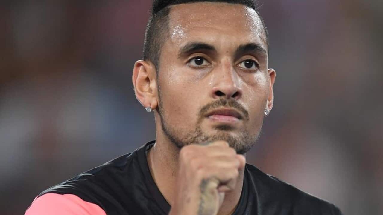 Nick Kyrgios of Australia celebrates his win